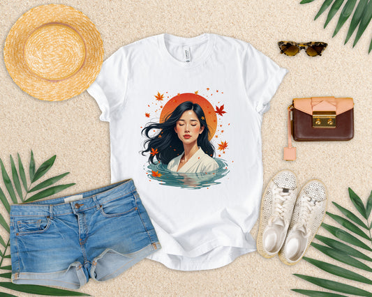Serene Woman in White Dress Chest-Deep in Water with Sunset and Falling Leaves Graphic T-Shirt