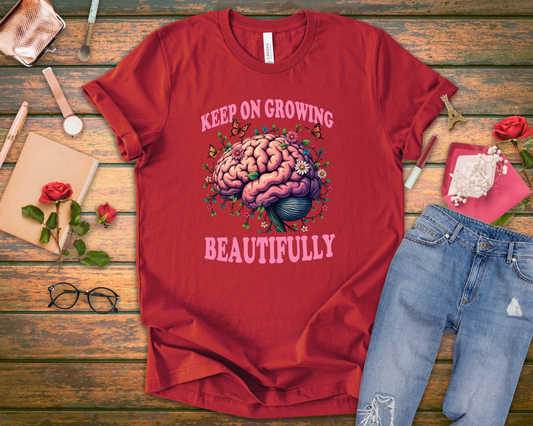 Keep on Growing Beautifully – Brain with Flowers, Plants & Butterflies Graphic T-Shirt