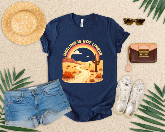 Healing Is Not Linear – Warm Desert Rainbow & Winding Road Graphic T-Shirt