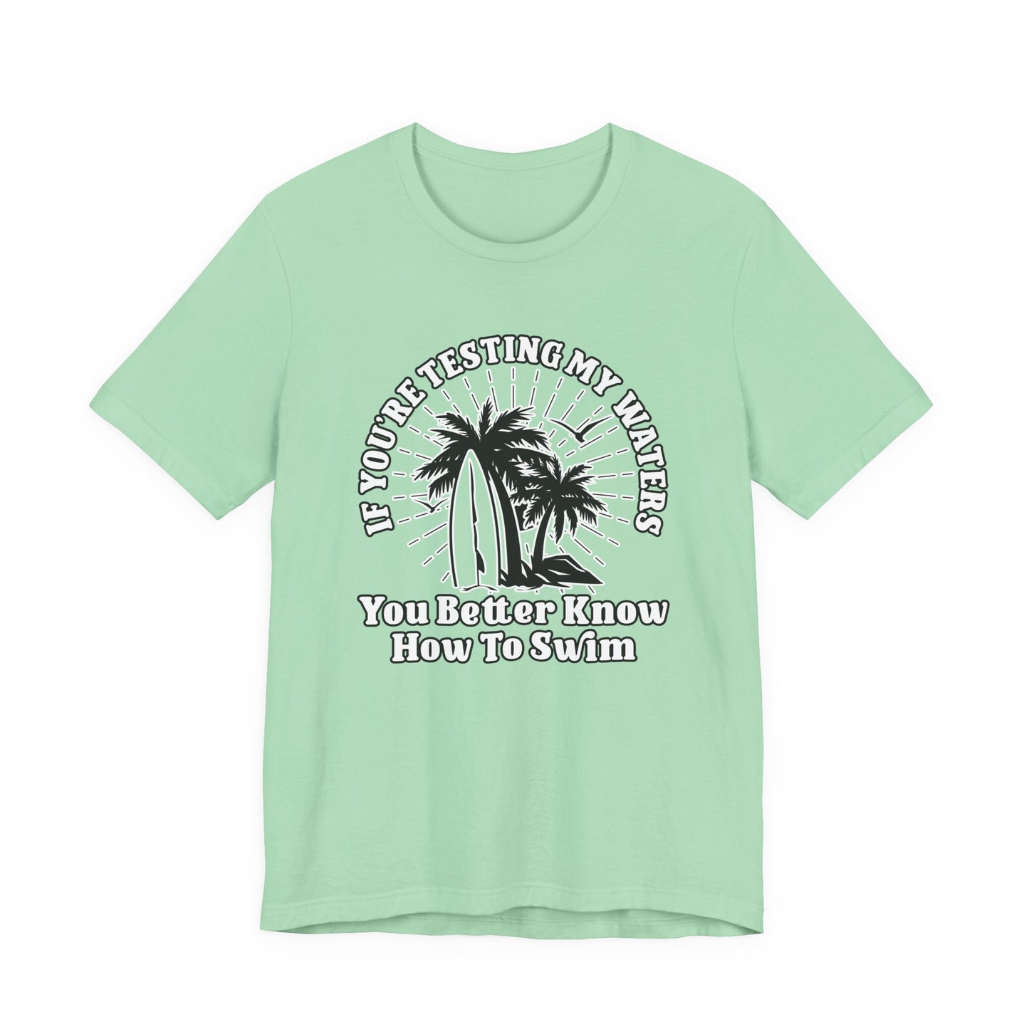 Test My Waters Surf T-Shirt – Beach Palm Trees & Rocks Graphic with Bold Quote