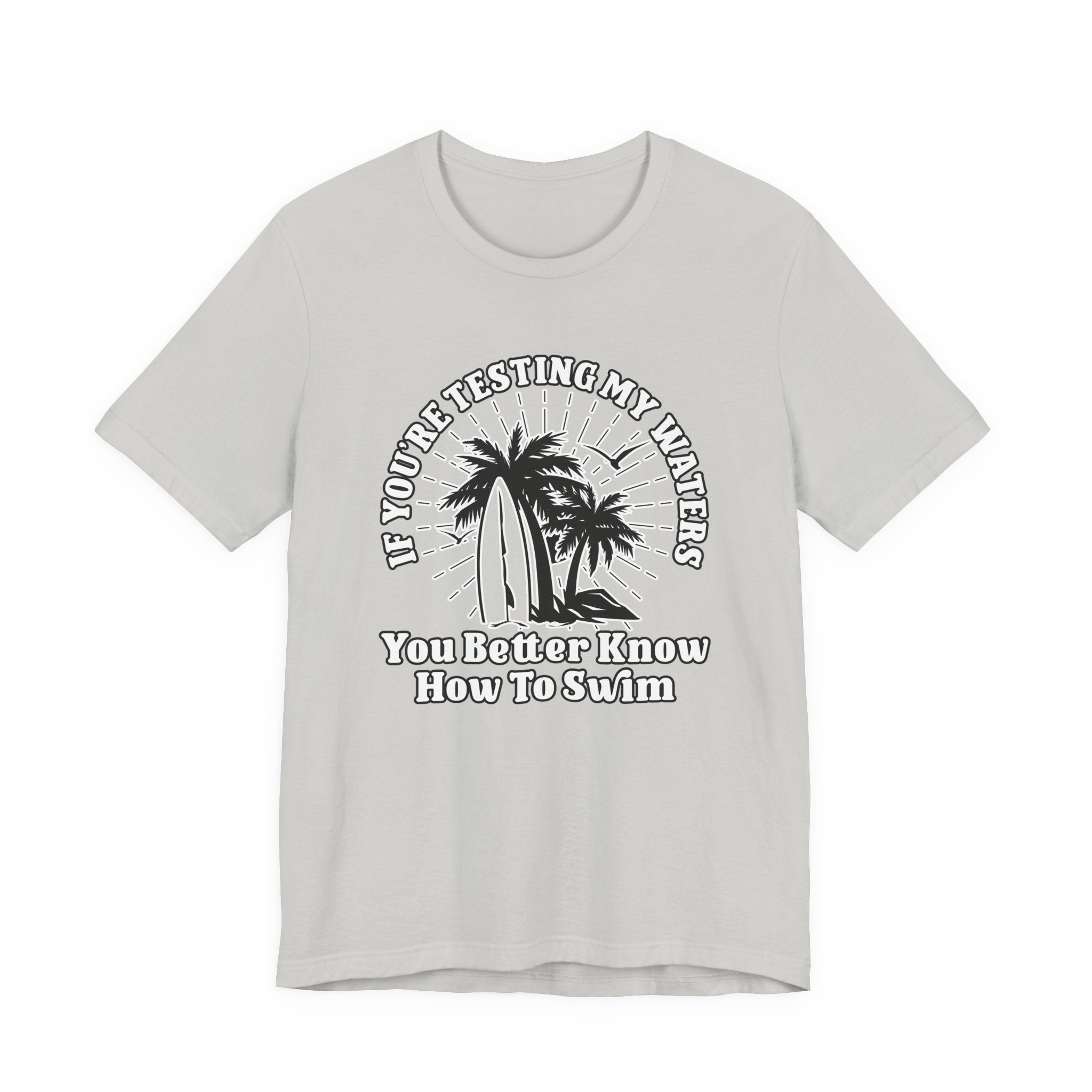 Test My Waters Surf T-Shirt – Beach Palm Trees & Rocks Graphic with Bold Quote