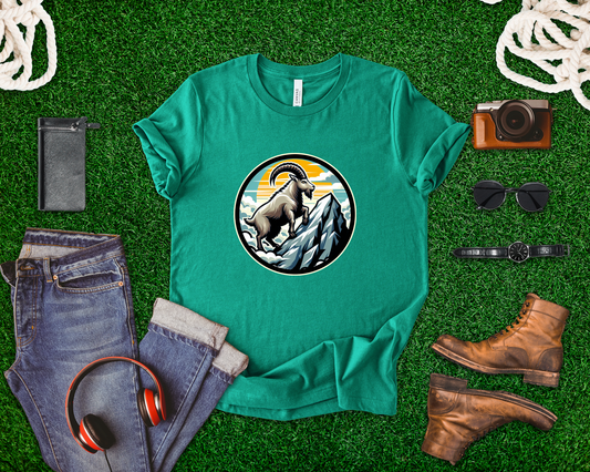 Majestic Mountain Goat on Summit with Sun and Clouds Graphic T-Shirt