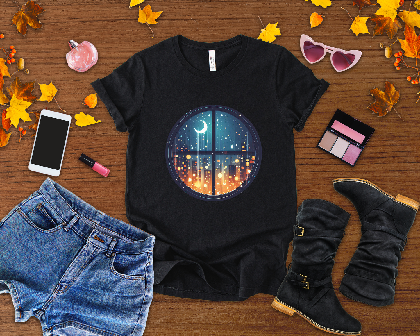 Dreaming Under Drizzles – Crescent Moon & Rainy Night in a City Window Graphic T-Shirt
