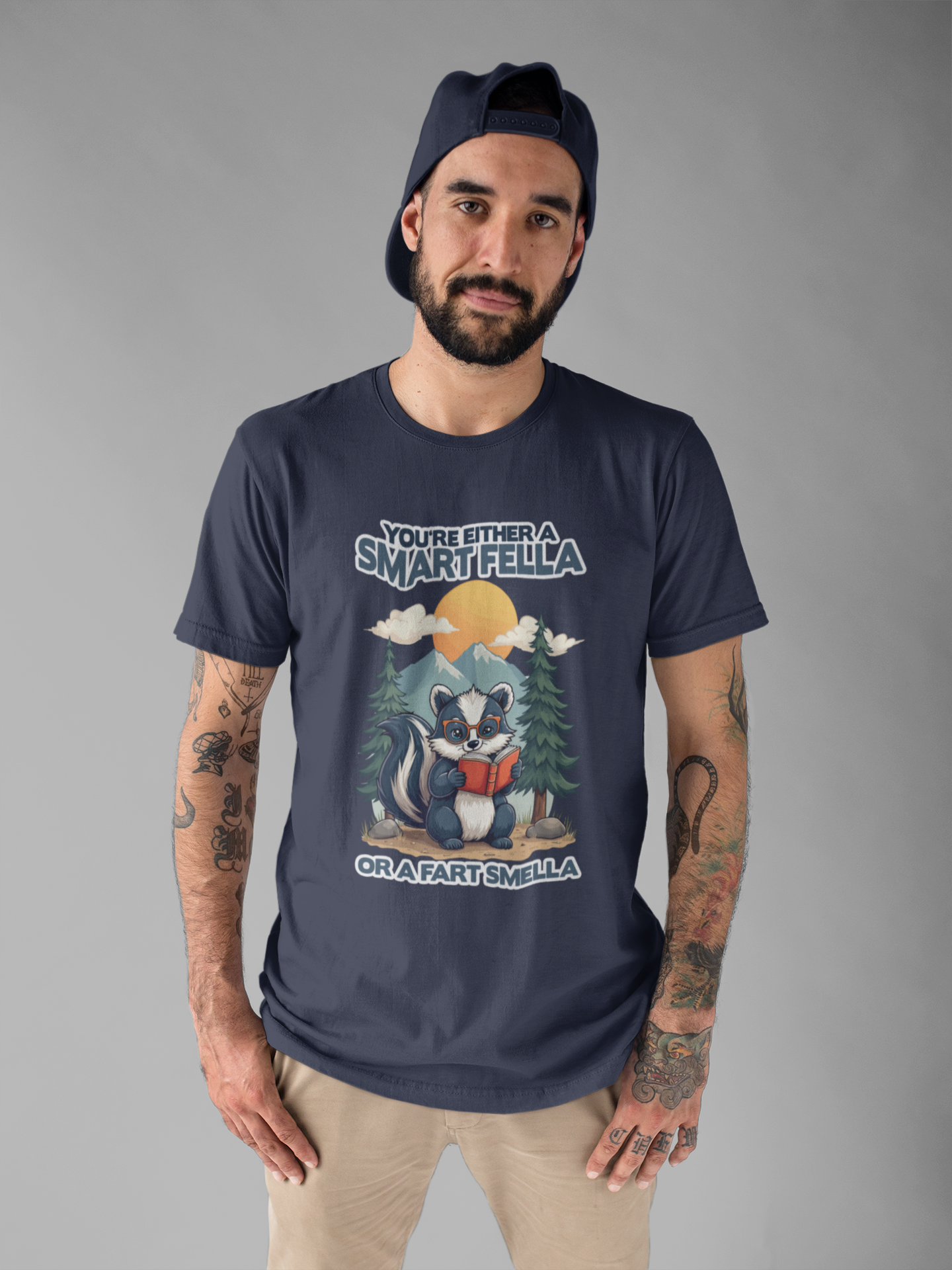 You're Either a Smart Fella or a Fart Smella Tshirt – Skunk in Colorful Space Suit with Sun & Mountain Background