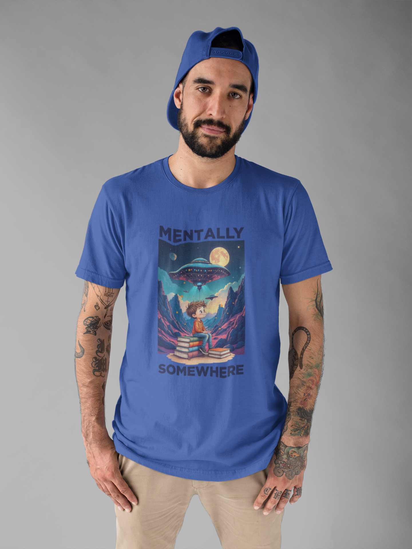 Mentally Somewhere Else – Boy on Books with Space Scene Graphic T-Shirt