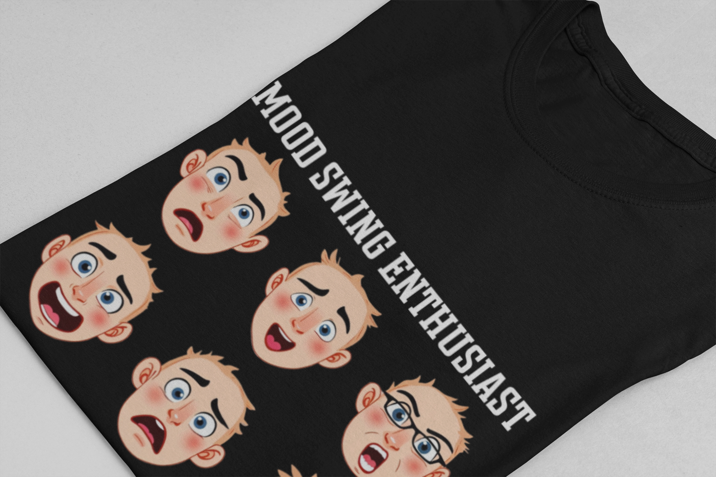 Mood Swing Enthusiast – Grid of Nine Expressive Faces Graphic T-Shirt