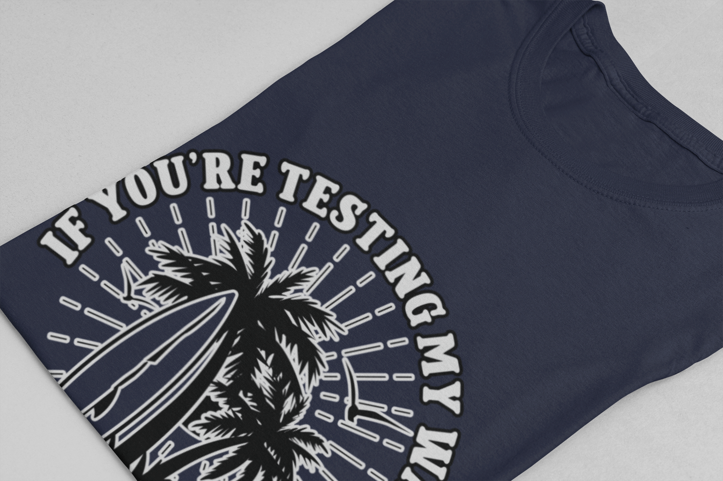 Test My Waters Surf T-Shirt – Beach Palm Trees & Rocks Graphic with Bold Quote