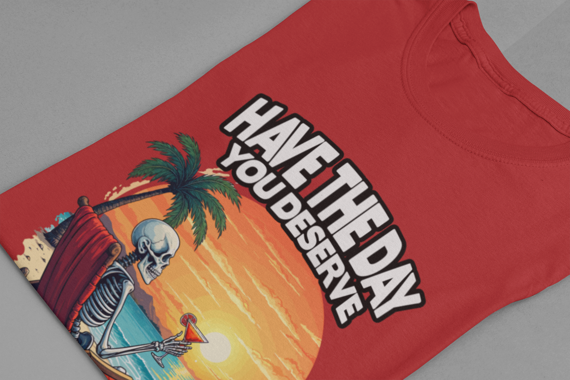 Have the Day You Deserve Tshirt – Relaxing Skeleton with Drink on Beach Sunset