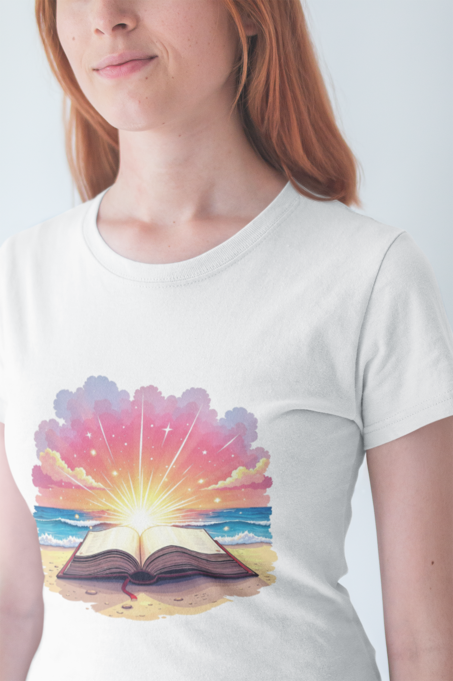 Magical Open Book on Beach with Radiant Flashlight Graphic T-Shirt