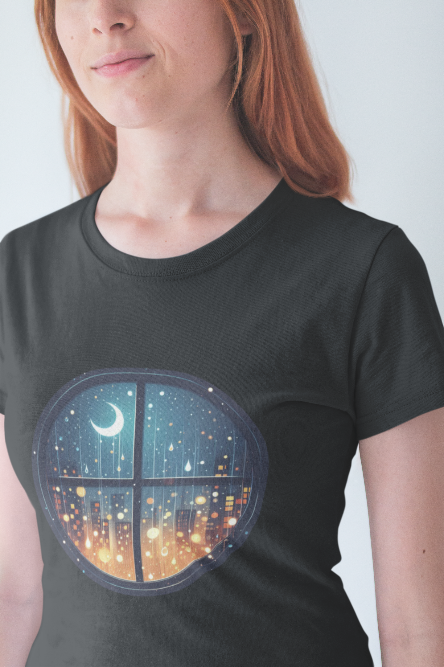 Dreaming Under Drizzles – Crescent Moon & Rainy Night in a City Window Graphic T-Shirt