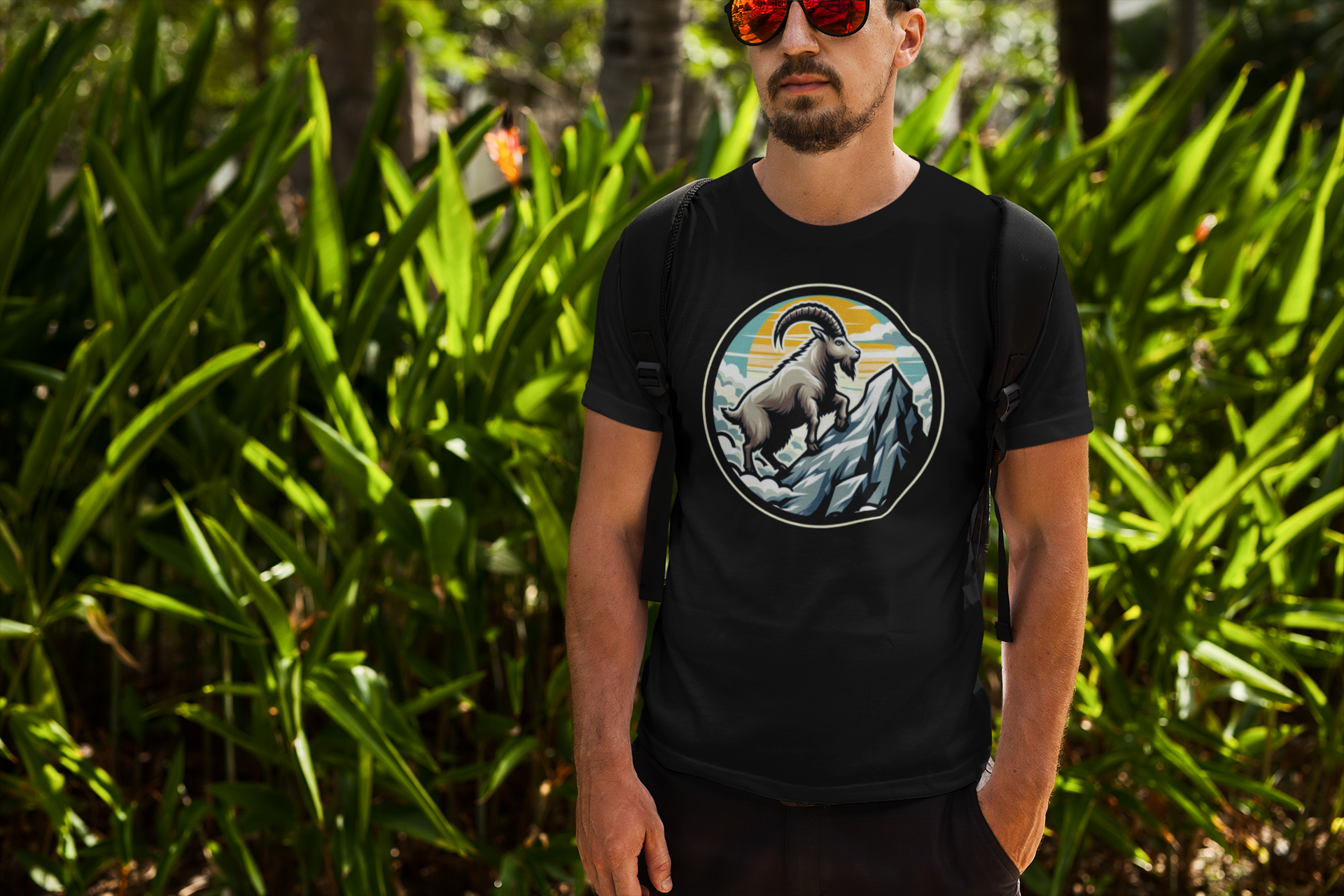 Majestic Mountain Goat on Summit with Sun and Clouds Graphic T-Shirt