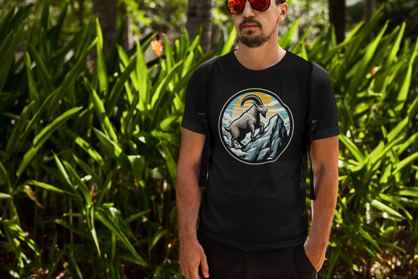 Majestic Mountain Goat on Summit with Sun and Clouds Graphic T-Shirt